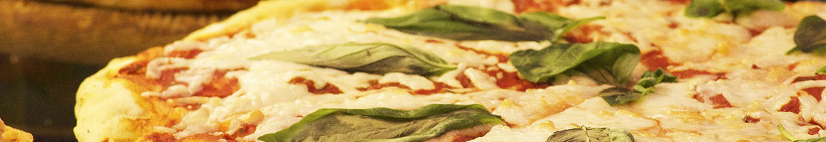 Eating Italian Pizza at Paisano's restaurant in Chantilly, VA.